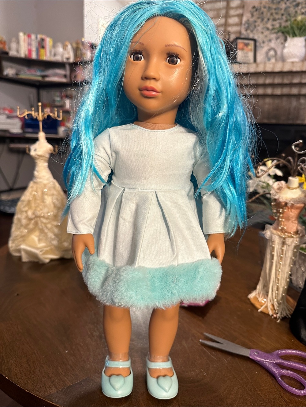 Blue-Haired Doll in Light Blue Dress with Faux-Fur Trim